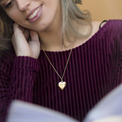 Woman Wearing Gold Plated Heart Locket Necklace, Double Heart Style