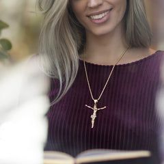 Woman wearing Gold Plated Jesus Pendant with Cubic Zirconia, Cross Necklace