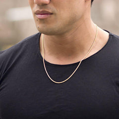 Gold Plated 1mm Rope Chain worn by a man as her necklace