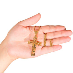 Gold Plated Large Filigree Cross in hand